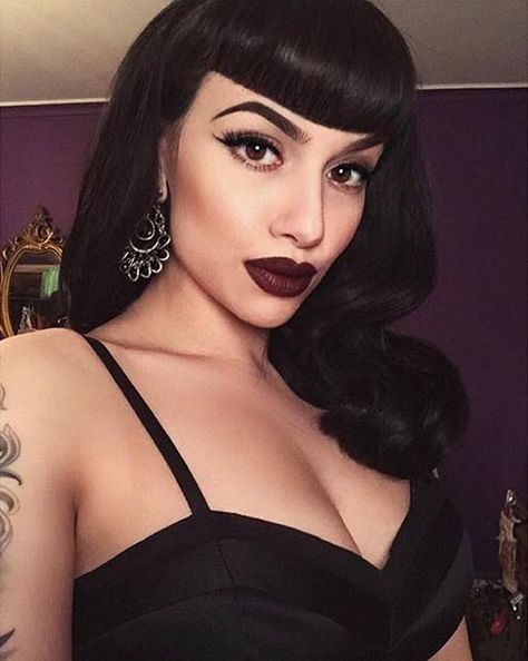 Brushed Curls With Short Blunt Bangs