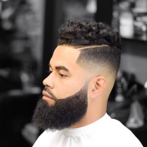 curls with hard part and fade