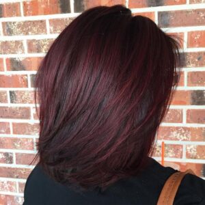 black hair with dark red highlights