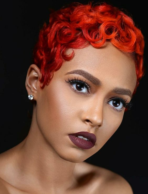 Tight curls in a bold Red