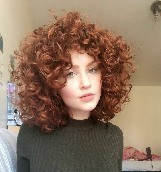Voluminous Curls with Face-Framing Layers