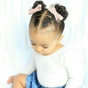 braided african american hair in pigtails
