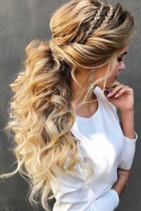 glam side braids tucked in