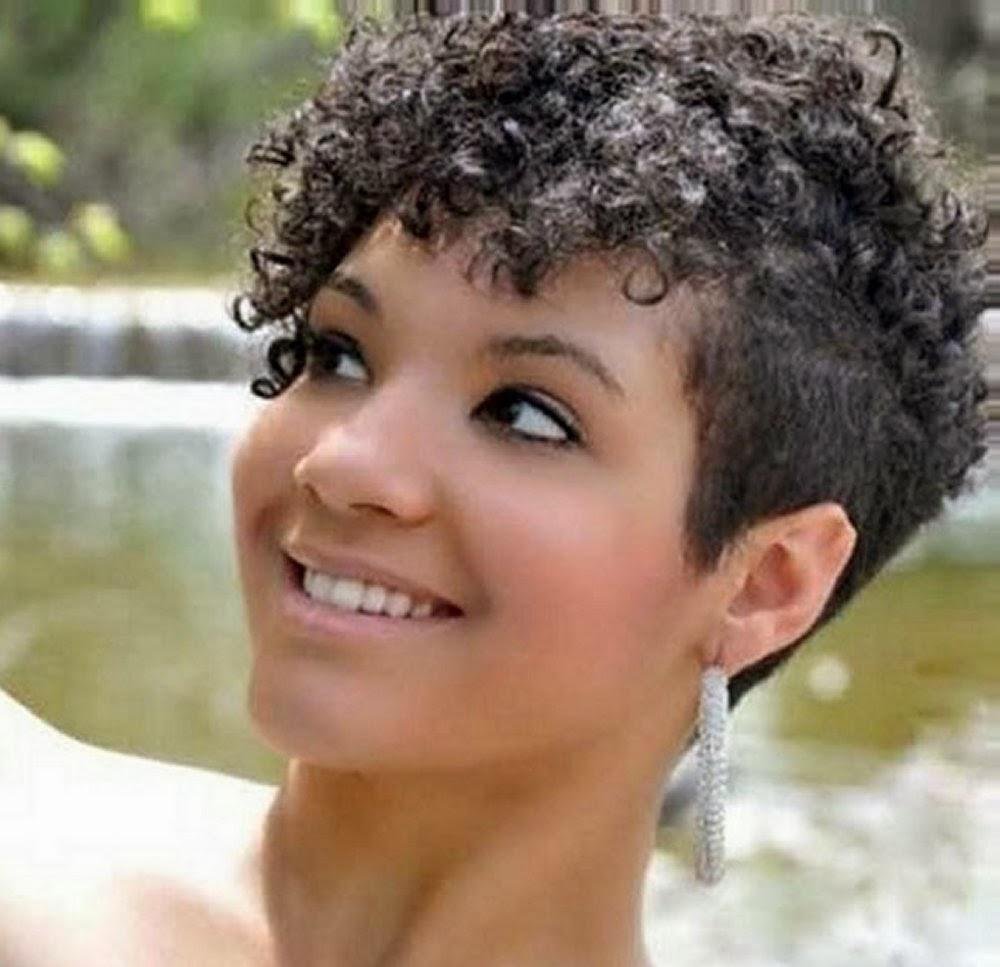 very short natural curly wedge haircut