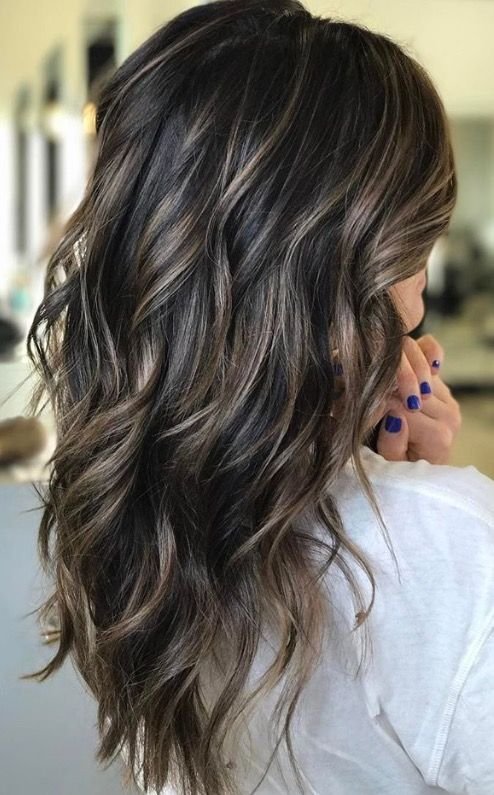 dark brown hair with frosted highlights