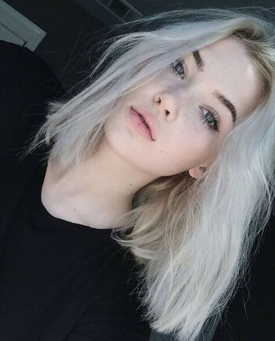 Blonde hair blue green eyes with white