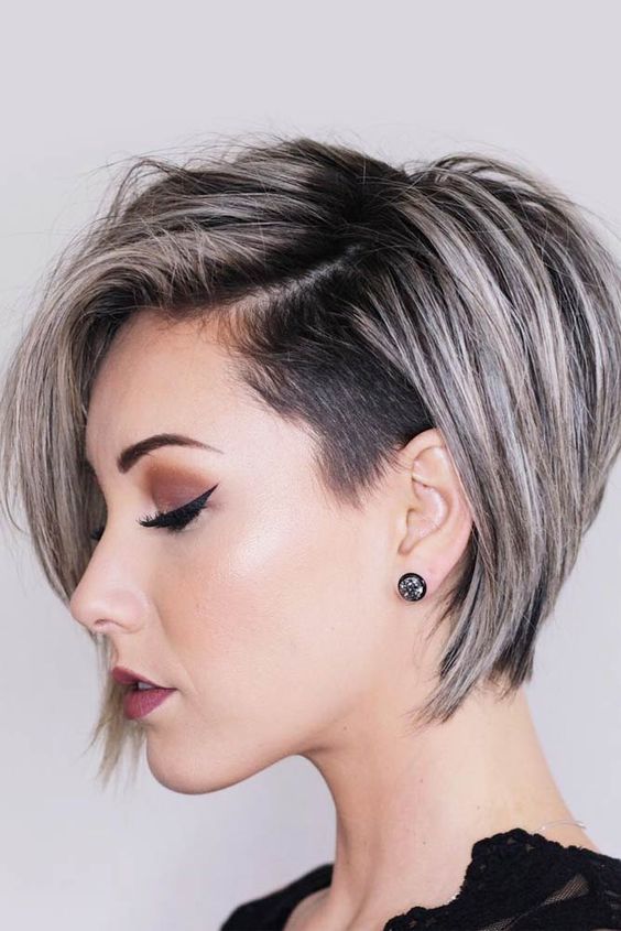 Kelly Osbourne's pixie cut with the sides clipper cut high and tight