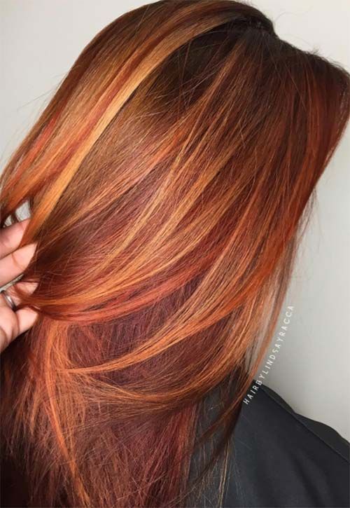 Shades of blonde hair with red highlights