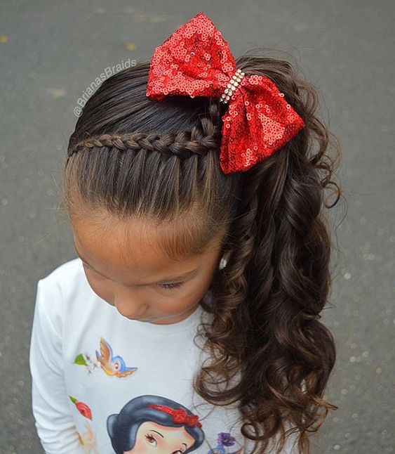 Image of Ponytail with a bow hairstyle for picture day