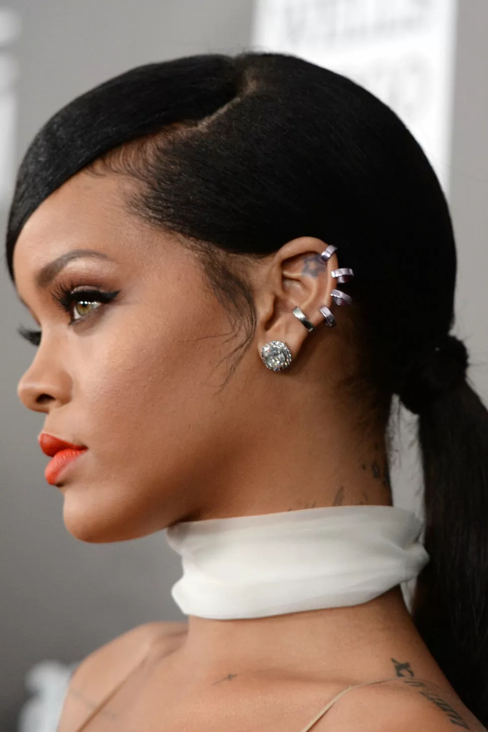 Low ponytail with side swept bang