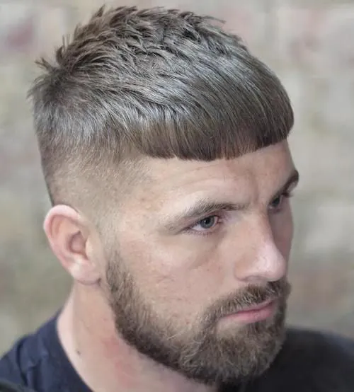 caesar fade with bold fringe