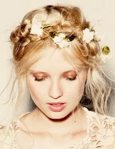messy milkmaid braid with flowers