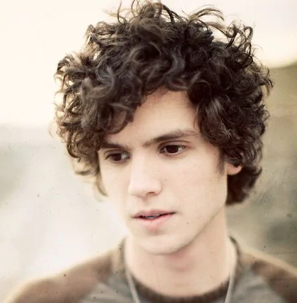 mid length curly cut