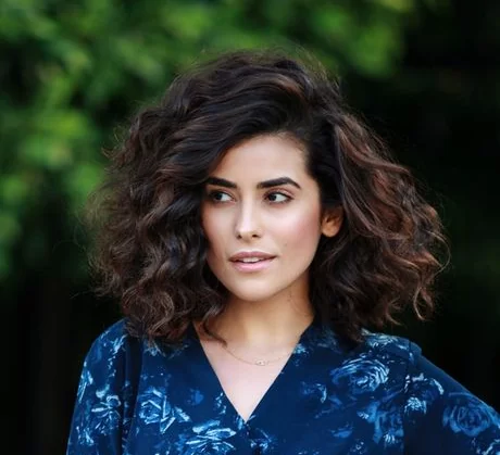 mid length curly cut