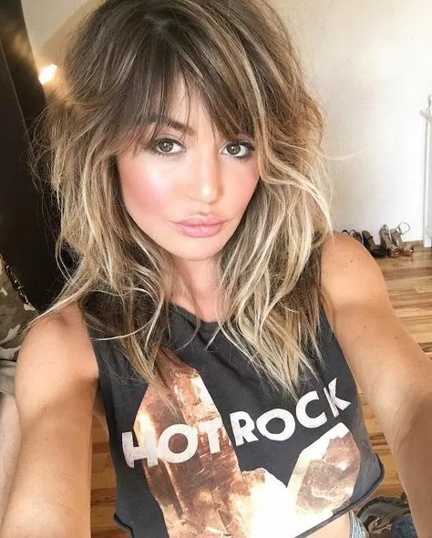 shaggy style with blonde highlights