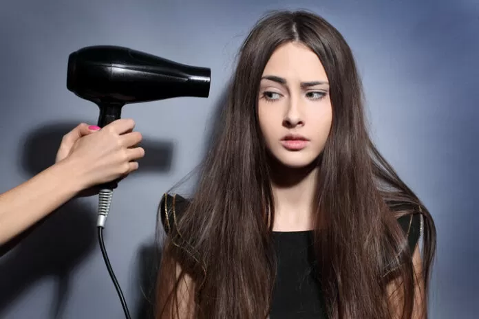 blow dry frizzy hair less