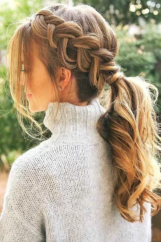 side braided hairstyle low ponytail