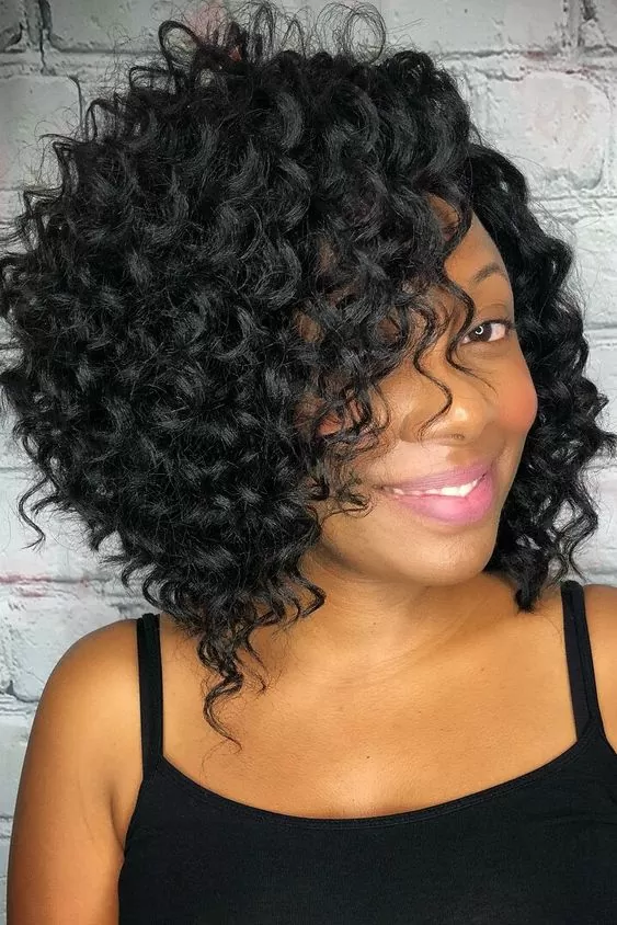 asymmetrical curly bob