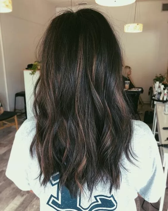 dark brown hair with blonde highlights