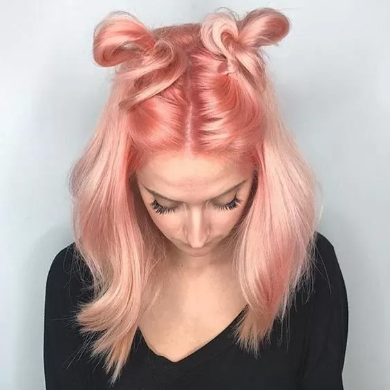 Metallic Peach Hair Color with Space Buns