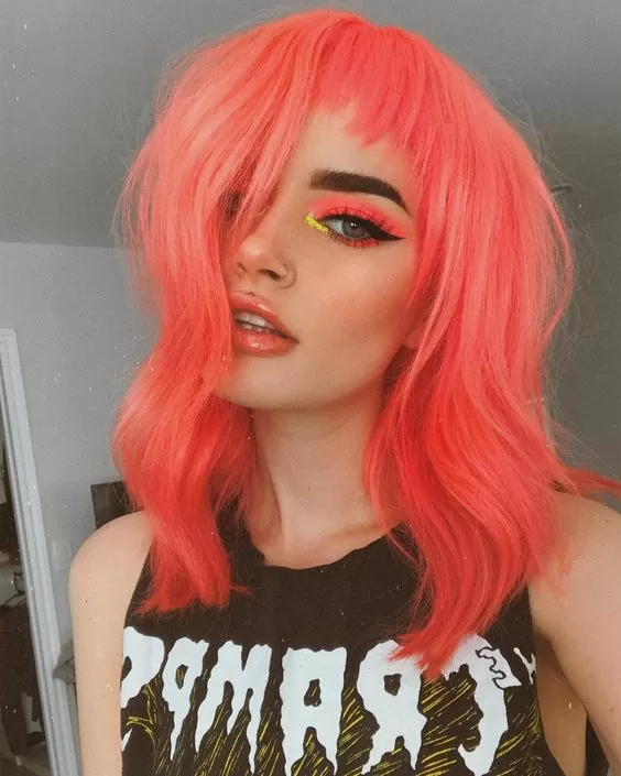 Neon Peach Hair Lob with Edgy Bangs