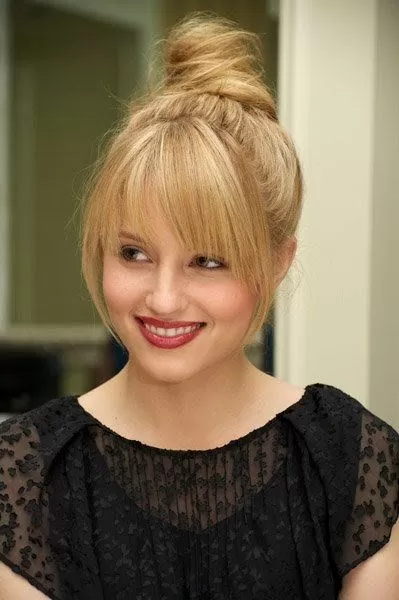 Classic Messy Bun with Face-Framing Bangs