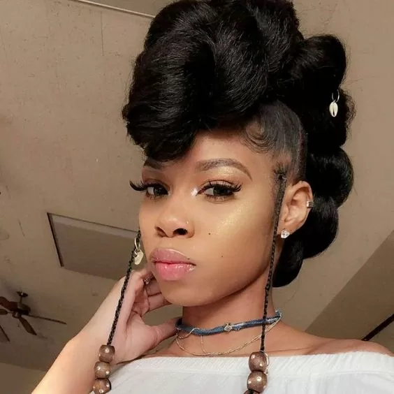 edgy mohawk with fulani style braids
