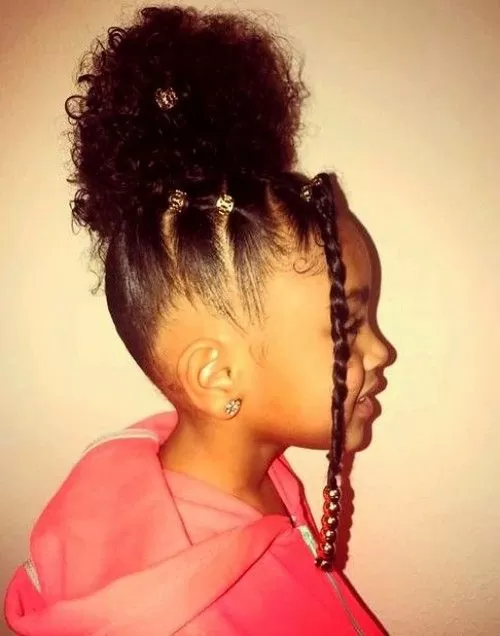high puff with beads and a front braid