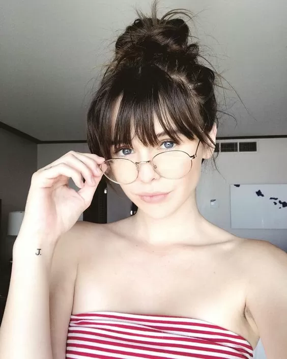 Eye-Skimming Bangs and Messy Bun